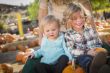 Young Family Enjoys a Day at the Pumpkin Patch