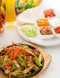 original fajita sizzling hot  on iron plate
