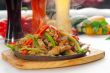 original fajita sizzling hot  on iron plate