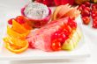 mixed plate of fresh sliced fruits