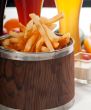 fresh french fries on a bucket