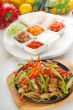 original fajita sizzling hot  on iron plate