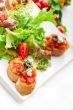 original Italian fresh bruschetta served with fresh salad and ve