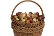 Mushrooms in a wicker basket on a white background.