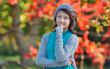 girl thinking in nature on background of autumn