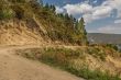 Dirt road going around the hills