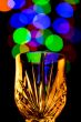 Light bubbles coming out of a wine glass