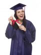 Mixed Race Graduate in Cap and Gown Holding Her Diploma