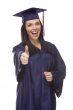 Mixed Race Graduate in Cap and Gown with Thumbs Up