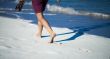 Caribbean cuba woman goes for a walk on the beach in the Caribbean