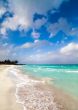 Caribbean Cuba beach with blue sky and clouds