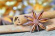 extremely closeup view of anise star and cinnamon sticks