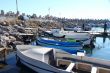 Boats near the jetty boat station on a sunny day.