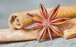 anise star and cinnamon sticks, on wooden table