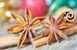 extremely closeup view of anise star and cinnamon sticks