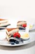 tiramisu dessert with berries and cream