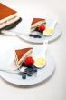 tiramisu dessert with berries and cream