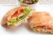 ciabatta panini sandwich with chicken and tomato
