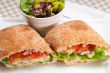 ciabatta panini sandwich with chicken and tomato