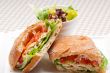 ciabatta panini sandwich with chicken and tomato