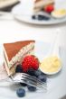 tiramisu dessert with berries and cream