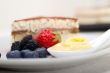 tiramisu dessert with berries and cream