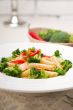 Italian penne pasta with broccoli and chili pepper
