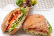 ciabatta panini sandwich with chicken and tomato