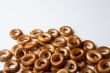 a bunch of bagels on a white background
