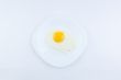 white plate with scrambled eggs