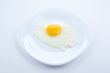 white plate with scrambled eggs