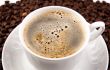cup of black coffee with foam