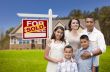 Hispanic Family, New Home and Sold Real Estate Sign