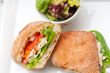 ciabatta panini sandwich with chicken and tomato