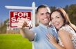 Military Couple In Front of Home, House Keys and Sign