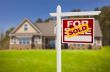 Sold Home For Sale Sign in Front of New House