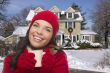 Smiling Woman in Winter Clothing Holding Mug Outside in Snow