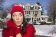 Smiling Mixed Race Woman in Winter Clothing Outside in Snow