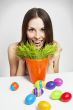 Girl and painted eggs