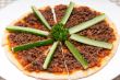 Turkish beef pizza with cucumber on top