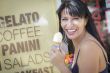 Pretty Italian Woman Enjoying Her Gelato at the Street Market.