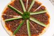 Turkish beef pizza with cucumber on top