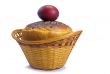 Red Easter eggs and Easter bread in a basket on a white backgrou