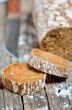 Brown bread on an old wooden table