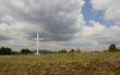 Old cross in the field.