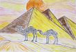 Two camels standing in front of the pyramids 