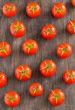 cherry tomatoes on vintage wooden table