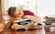 teenager girl sleeping on books