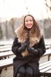 Business woman laughing in the park