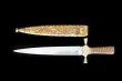 Cold weapon on black background